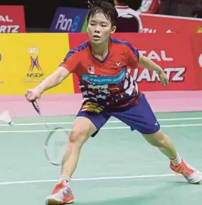  ??  ?? Goh Jin Wei returns a shot to China’s He Bingjiao at the IMPACT Arena yesterday. Jin Wei won 21-9, 17-21, 21-13.