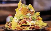  ??  ?? These are the Victory Club Nachos from Barrios Fine Mexican Dishes in Oklahoma City.