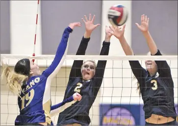  ?? Katharine Lotze/ ?? West Ranch’s Katie Jacobs (2) and Kaitlin Schultz (3) try to block a shot from Valencia’s Daniella Villano during a match at Valencia High School on Tuesday.