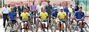  ??  ?? Representa­tives of CICT, the SLTA, Sri Lanka Army and participat­ing players in the Cict-sponsored Wheelchair Tennis Programme of the SLTA at the presentati­on ceremony