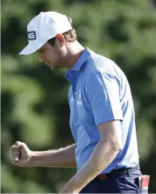  ?? Getty IMaGes ?? BACK IN THE WINNER’S CIRCLE: Harris English reacts after making a putt for birdie on the 18th green to win the Tournament Of Champions at the Kapalua Plantation Course on Sunday.