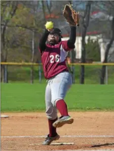  ?? PETE BANNAN — DIGITAL FIRST MEDIA ?? Penn Wood pitcher Ameenah Ballenger, seen throwing in a game against Chichester last week, had an amazing day Monday both on the mound and at the plate for the Patriots in a win over West Catholic.