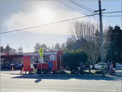  ?? RUTH SCHNEIDER — THE TIMES-STANDARD ?? A small crowd waits for food outside the Loco Fish Co. food truck on Sunday afternoon in Myrtletown.