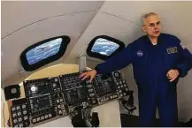  ?? Steve Gonzales / Houston Chronicle ?? Astronaut Lee Morin, chief of the Crew Interface Rapid Prototypin­g Lab, explains the testing of the Orion displays. “Technology has moved on,” Morin says.