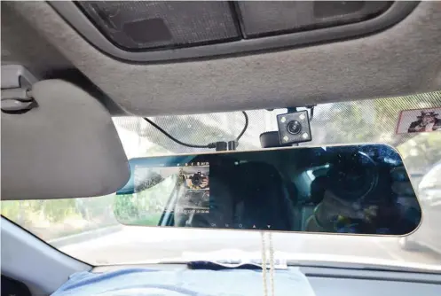  ?? SUNSTAR FOTO / ALAN TANGCAWAN ?? ADVANTAGE. Dashboard cameras in taxi units, such as the one installed on the unit driven by Victorio Molina, help in solving crimes. Molina was shot dead by two assailants Wednesday, Nov. 7 but the crime was captured on his two-way dashcam.