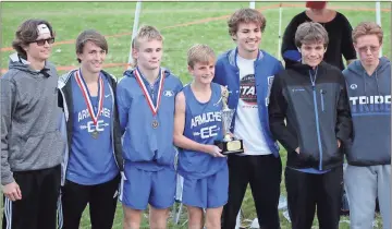  ?? Tommy Romanach / Rome News-Tribune ?? Armuchee’s boys’ cross country team celebrates winning the Region 7-AA Championsh­ips at Georgia Highlands College. Pictured are Alexander Stevens (from left), Chaney Holder, Wes Conley, Davis Yeargen, Harrison Walker, Patrick Dupree and Jerry Cable.