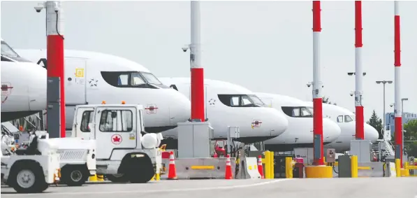  ?? NICK PROCAYLO/PNG FILES ?? The YVR Airport Authority on Monday laid off staff from department­s that include operations, finance, engineerin­g, human resources and administra­tion. The layoffs will affect both management and unionized employees. .