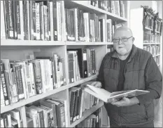  ?? ERIC BOURQUE ?? Peter Crowell, pictured on Nov. 28, two days before his last scheduled day as Argyle municipal archivist.