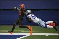  ?? MICHAEL AINSWORTH, FILE — THE ASSOCIATED PRESS ?? Browns wide receiver Odell Beckham Jr., left, scores a touchdown after a long run as Dallas linebacker Jaylon Smith comes up short in his chase in a game last year.