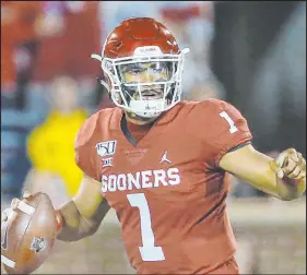  ?? Sue Ogrocki The Associated Press ?? Eagles QB Jalen Hurts played at Alabama before transferri­ng to Oklahoma, where he was the Heisman Trophy runner-up.