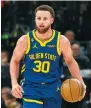  ?? ?? Warriors’ Stephen Curry in charge in taking on the Timberwolv­es.