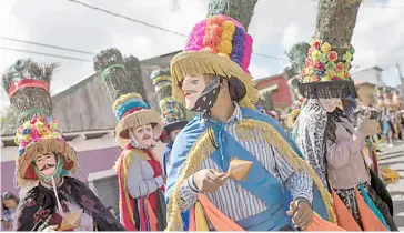  ?? STR/AGENCE FRANCE-PRESSE ?? LOCALS perform the ‘El Toro Huaco’ traditiona­l dance during the San Sebastian festivity in Diriamba, Carazo province, some 50 kilometers south of Managua, Nicaragua.