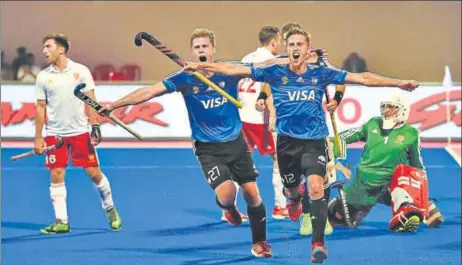  ?? PTI PHOTO ?? Lucas Vila (12) of Argentina celebrates after scoring against England during their quarterfin­al at Hockey World League Final.