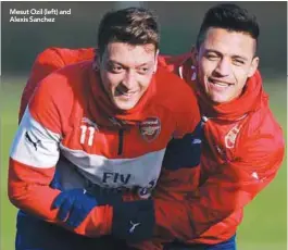  ??  ?? Mesut Ozil (left) and Alexis Sanchez