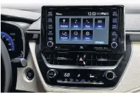  ??  ?? The 2020 Toyota Corolla has upgrades on the interior as well. The infotainme­nt screen is 18 cm on the base model and 20 on the SE and XSE. Both support Apple CarPlay but not Android Auto.