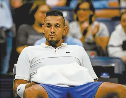  ??  ?? Nick Kyrgios during a change of ends against Andrey Rublev of Russia. The Australian lost the third-round US Open match in straight sets.