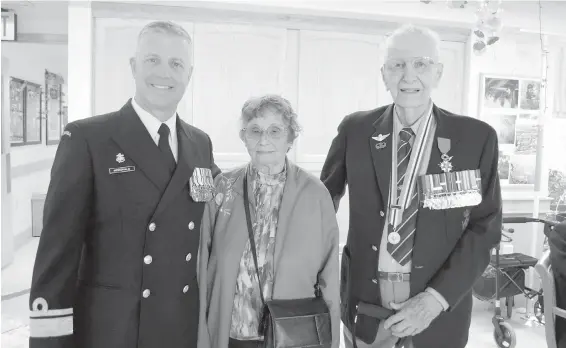  ??  ?? Commander Maritime Forces Pacific Rear-Admiral Art MacDonald, left, with Melody and Frank Poole.