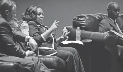  ??  ?? Southwest Tennessee Community College President Tracy Hall talks about minority owned businesses as University of Memphis President Paul Rudd, left, listens during a forum discussion education and economic developmen­t at the Guesthouse at Graceland....