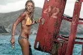  ??  ?? It’s Blake Lively versus a shark in The Shallows.