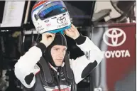  ?? John Raoux / Associated Press ?? Parker Kligerman, a native of Stamford and graduate of Staples High School, prepares himself for a practice session for the Daytona 500 on Friday.