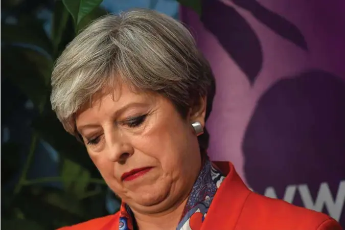  ?? TOBY MELVILLE, NTB SCANPIX ?? Den britiske statsminis­teren Theresa May sliter med å få støtte for det hun mener brexit bør vaere.