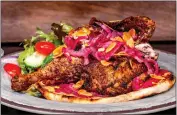  ?? ?? The Food & Wine Festival at Disney California Adventure starts March 1with dishes like chicken Musakhan.