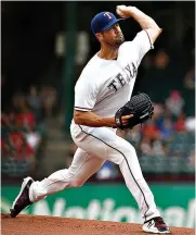  ?? AP Photo/ Mike Stone ?? Texas Rangers starting pitcher Cole Hamels delivers against the Oakland Athletics on Monday in Arlington, Texas. In his last home start for Texas before the trade deadline Tuesday, Hamels (5-9) allowed seven runs against Oakland. It was the third time...