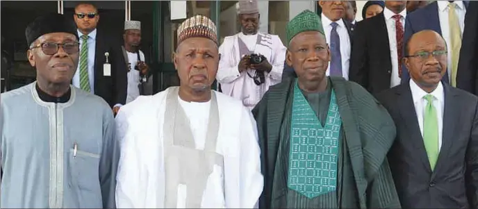  ??  ?? L-R: Minister of Agricultur­e and Rural Developmen­t, Audu Ogbeh; Katsina State Governor Aminu Bello Masari; Kano State Governor, Abdullahi Ganduje; and CBN Governor, Godwin Emefiele during the national flag off of the programme