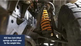  ??  ?? XGS two-inch-lifted springs up front cater for the weight hike.