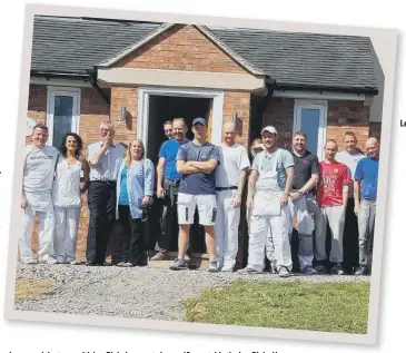  ??  ?? James and the team with Lee Rigby’s parents Lyn and Ian outside the Lee Rigby House