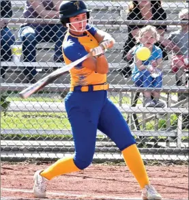  ?? PILOT PHOTO/RON HARAMIA ?? Triton’s Madeline Doll gets one of her two hits Monday on this swing.