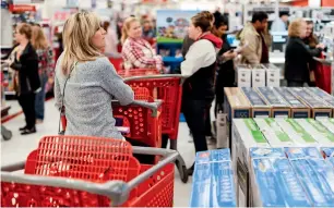  ?? AP ?? Consumer spending, which accounts for more than two-thirds of US economic activity, increased at a 3.5 per cent rate in the third quarter, slightly down from 3.6 per cent estimated in November. —