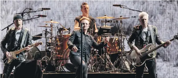  ?? SUZANNE CORDEIRO/AFP/GETTY IMAGES ?? Irish rockers U2 played its beloved Joshua Tree album from start to finish to the delight of fans worldwide.