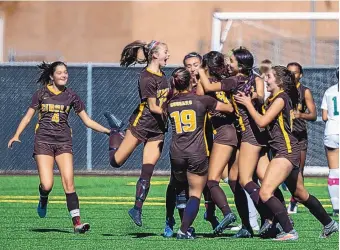  ?? MIKE SANDOVAL/FOR THE JOURNAL ?? Cibola players after scoring the game’s only goal Saturday in a 1-0 victory over visiting Rio Rancho in the quarterfin­als of the girls Class 5A state tournament. The Cougars face No. 4 Hobbs next.