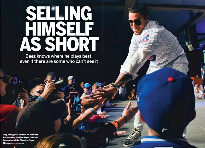  ?? MATT MARTON/AP ?? Javy Baez greets some of his admirers Friday during the first day of the Cubs Convention at the Sheraton Grand Chicago.