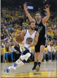  ?? AP PHOTO/MARCIO JOSE SANCHEZ ?? Golden State Warriors' Stephen Curry, left, dribbles past San Antonio Spurs' Pau Gasol during the first half of Game 2 of the NBA basketball Western Conference finals, Tuesday in Oakland, Calif.