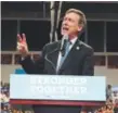  ??  ?? Gov. John Hickenloop­er speaks at Adams City High School in August during a campaign stop by Democratic presidenti­al nominee Hillary Clinton.