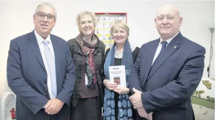  ??  ?? Police and Crime Commission­er Arfon Jones, left, officially opens the new Rape & Sexual Abuse Support Centre in Bangor, with deputy chair for RASASC Nonn Williams, AM Siân Gwenllian and MP Hywel Williams