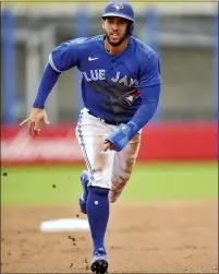  ?? STEVE NESIUS — THE ASSOCIATED PRESS ?? After seven years with the Houston Astros, 2017World Series MVP George Springer is now a member of the Toronto Blue Jays.