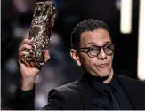  ??  ?? French actor Roschdy Zem holds his trophy on stage after he won the Best Actor award for “Roubaix, une lumiere (Oh Mercy !)”.