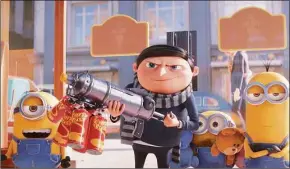  ?? Illuminati­on Entertainm­ent / Associated Press ?? This image released by Universal Pictures shows characters, from left, Stuart, Gru, voiced by Steve Carell, Bob and Kevin in a scene from “Minions: The Rise of Gru.”