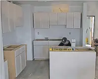  ?? SUBMITTED PHOTO/ATTILA TOLNAI ?? This photo shows one of the kitchens of a Breton Apartments unit while under constructi­on in Port Hawkesbury. The project’s developers say the first tenants could be just days from moving into their units.