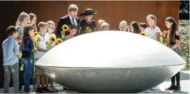  ?? (AFP) ?? Dutch King Willem-Alexander (centre, left) and Queen Maxima (centre) attend the unveiling of the National Monument for the MH17 victims, in Vijfhuizen on Monday