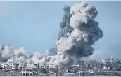  ?? ?? Smoke rises from the Gaza Strip after Israeli strikes yesterday.