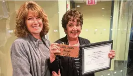  ?? CONTRIBUTE­D ?? Lee Jean Heller (right) and her daughter, Stacey Swank, after a West Carrollton City Council meeting in which Heller was inducted into the West Carrollton Plaza of Fame, on April 9. The annual award recognizes current or former residents for making the city a better place to live and work.