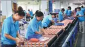  ?? HE MAOFENG / FOR CHINA DAILY ?? Workers on the assembly line at Shenzhen-based battery producer OptimumNan­o Energy Co Ltd’s factory in Chenzhou, Central China’s Hunan province.