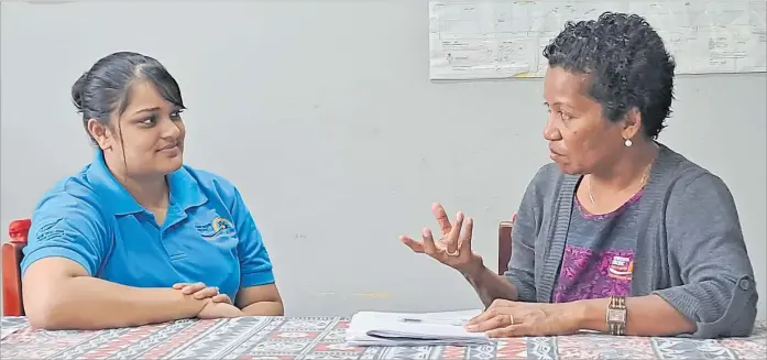  ?? Picture: SUPPLIED ?? Empower Pacific counsellor­s Rakshika Singh and Akene Lagilagi in an informal discussion at the Empower Pacific office in Lautoka.