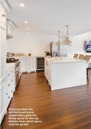  ??  ?? KNOCKING DOWN THE OLD-FASHIONED ROUND CONSERVATO­RY GAVE THE FAMILY SPACE FOR THIS BIG KITCHEN-DINER WHICH OPENS ONTO THE GARDEN