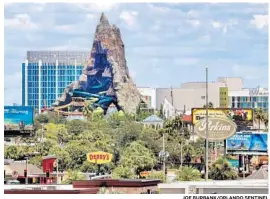  ?? JOE BURBANK/ORLANDO SENTINEL ?? A view looking north at Internatio­nal Drive, including Universal Orlando’s Volcano Bay water park and the Cabana Bay Beach Resort hotel, photograph­ed Aug. 6.