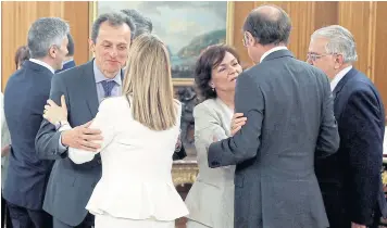  ?? EPA ?? Spanish Lower Chamber Speaker, Ana Pastor, left, congratula­tes new Spanish science minister Pedro Duque in Madrid, Spain.